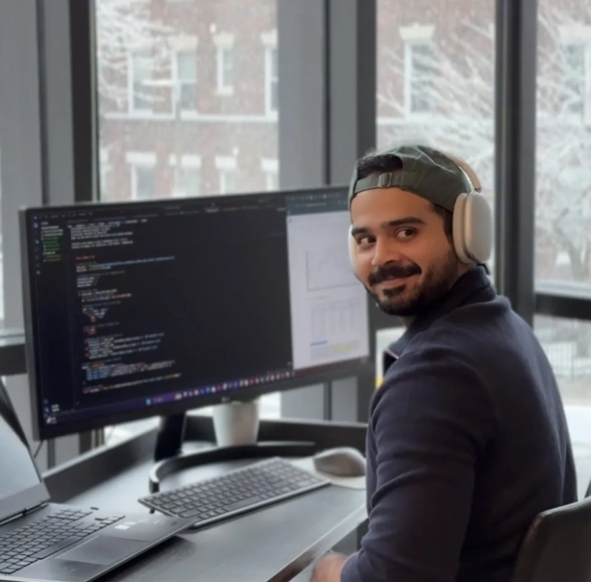 Arshman at his desk